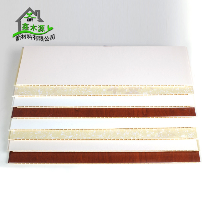 厂家直销竹木纤维集成墙板 全屋定制环保装饰板PVC木塑600护墙板图片